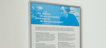 Klick auf das Foto öffnet mehr Informationen Bilderrahmen mit dem Leitbild